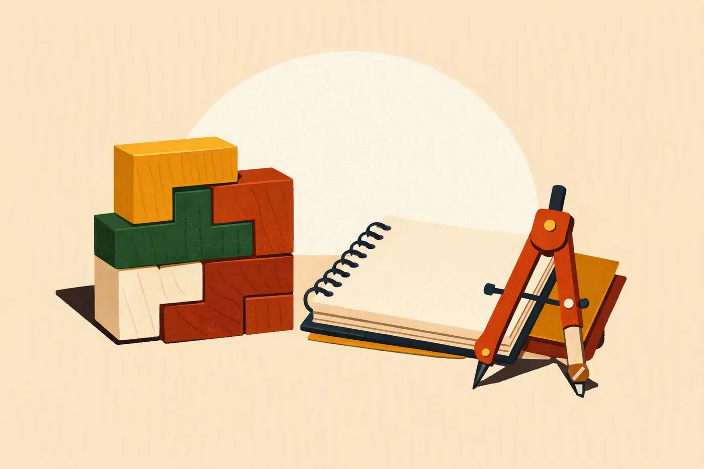 Blocs en bois, carnet et compas sur une surface neutre